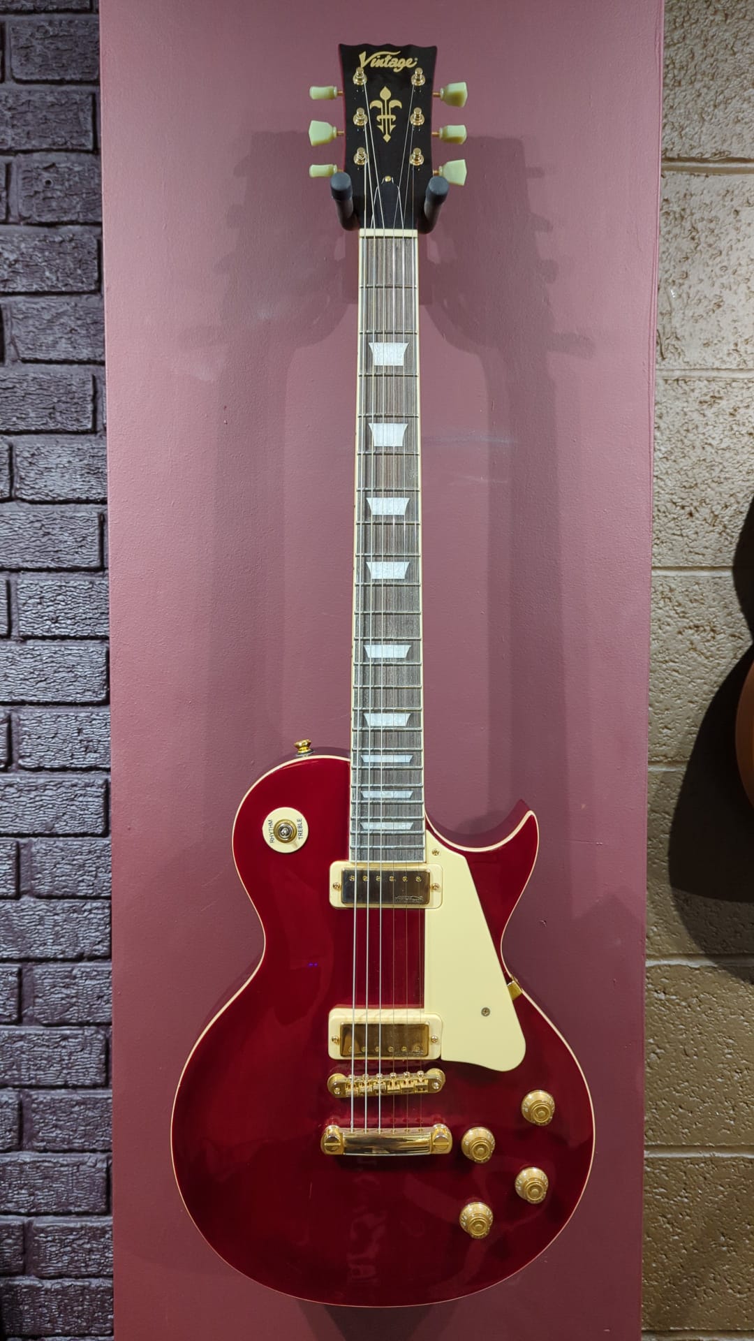 Vintage* V100M Wine Red Electric Guitar - Ex Display with 1 small scratch and missing switch tip (With FREE Vintage Custom Pro Upgrade worth £45), Electric Guitar for sale at Richards Guitars.