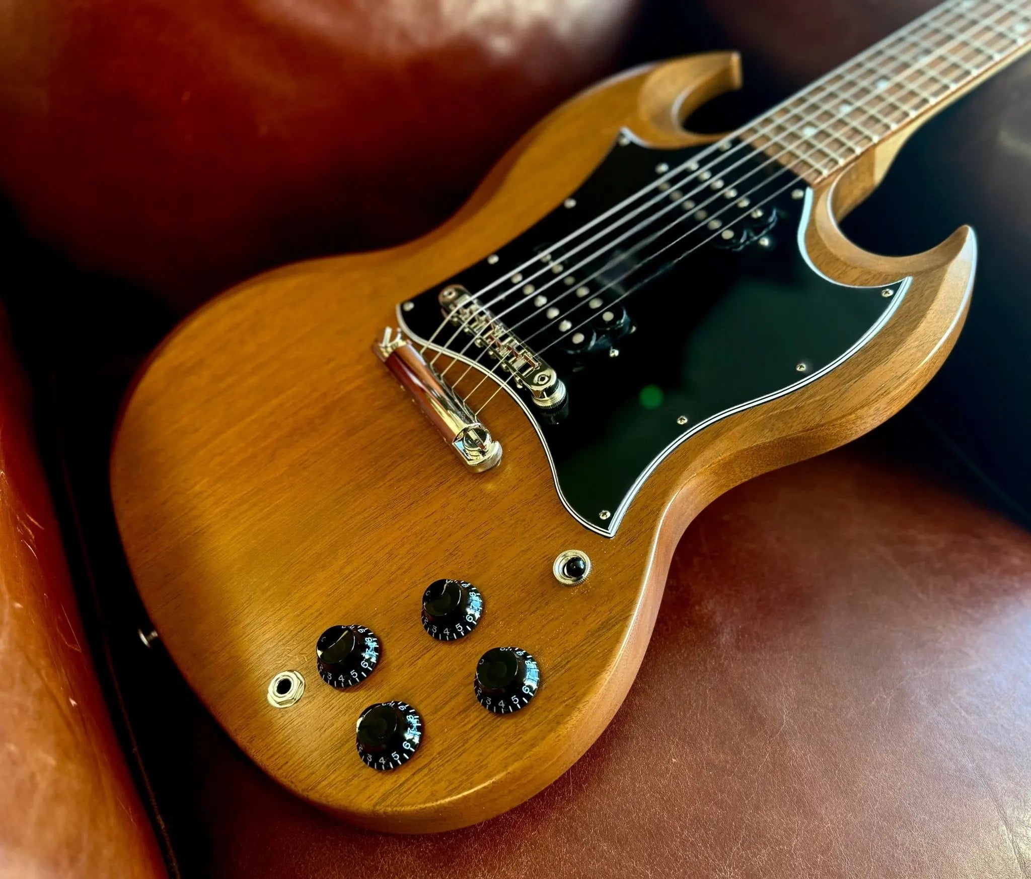 Gibson Tribute SG in Natural Walnut (used) - Richards Guitars Of Stratford Upon Avon
