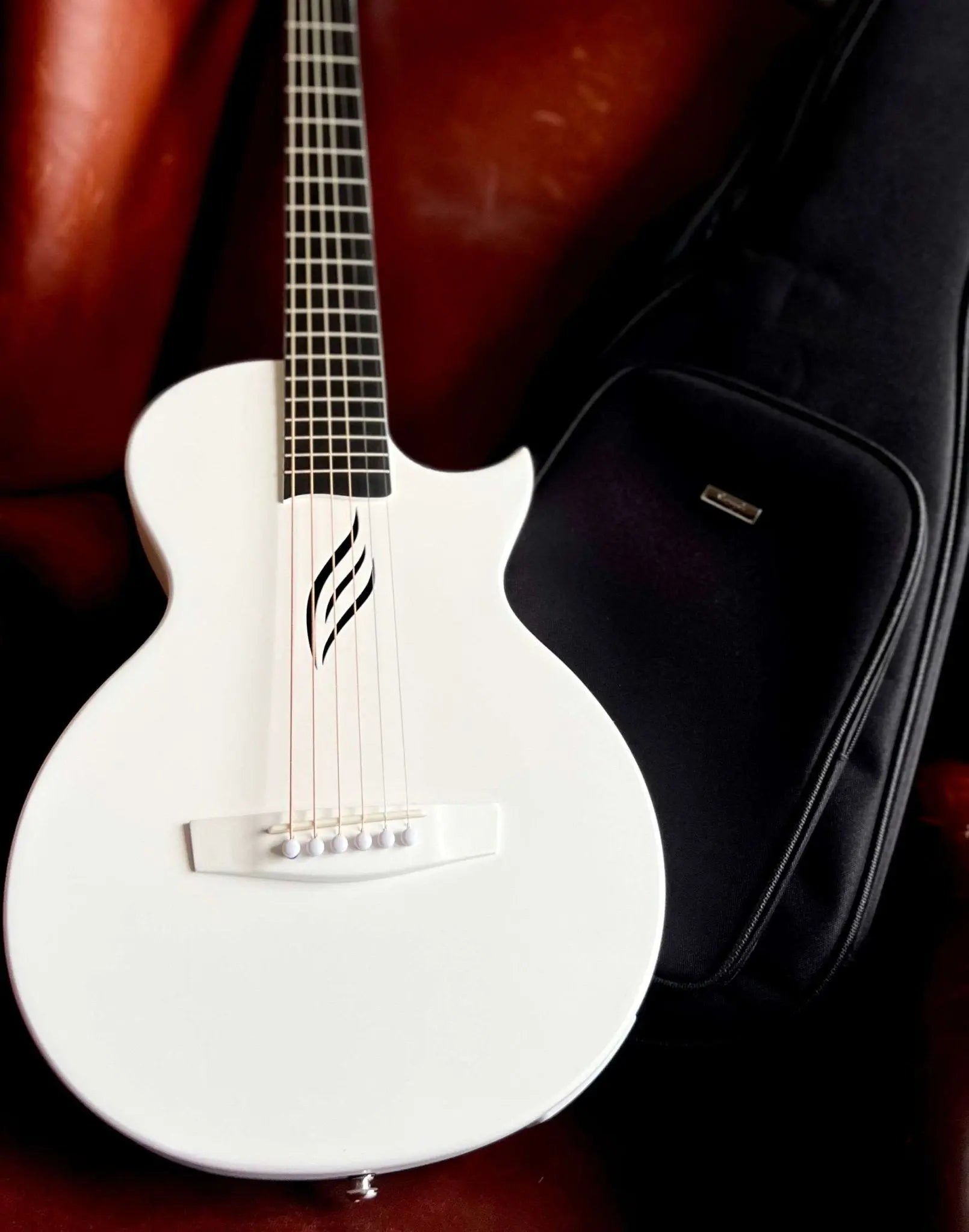 Enya Nova GO SP1 - WH White Nova Go Carbo fibre electro guitar with Bluetooth - Richards Guitars Of Stratford Upon Avon