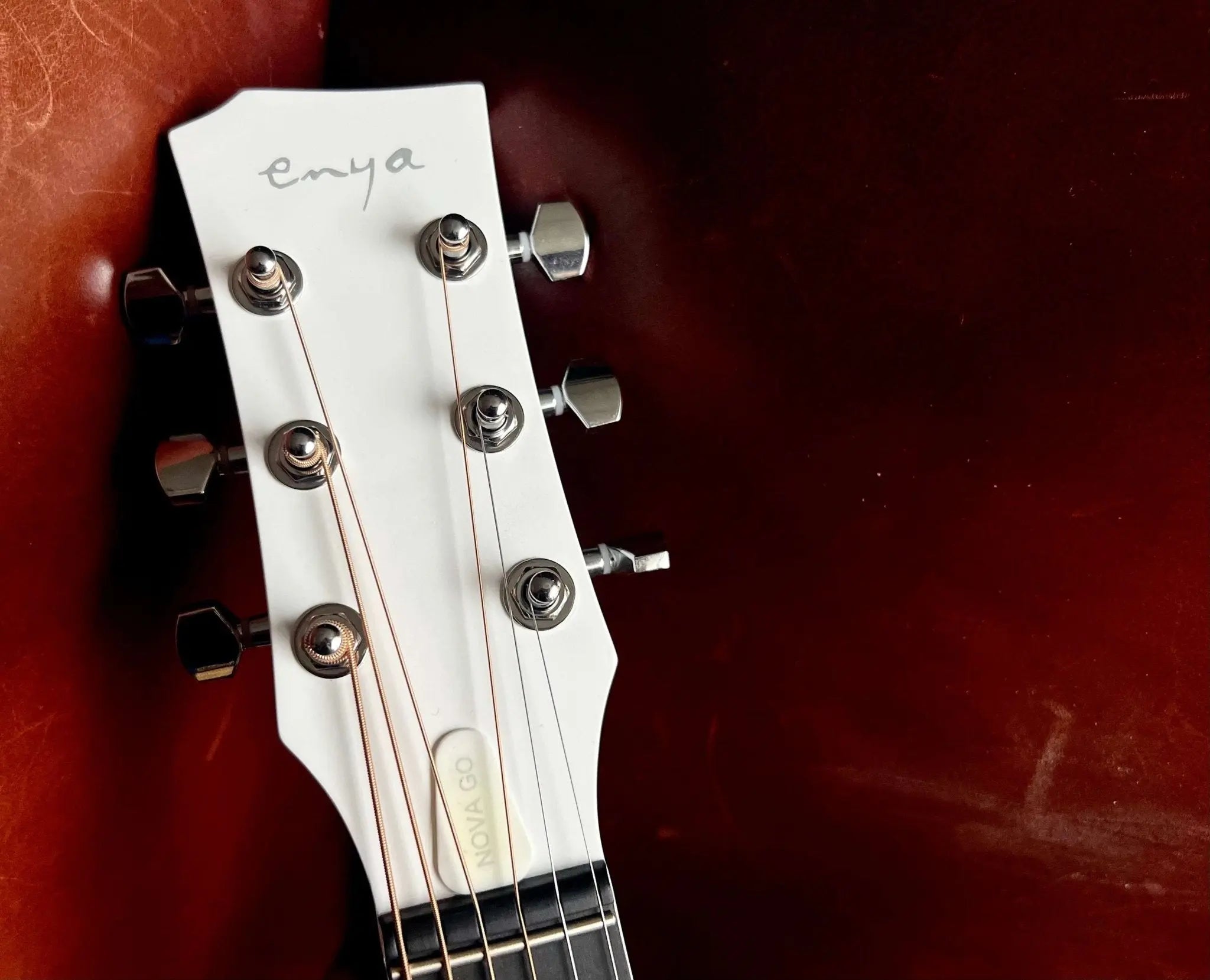 Enya Nova GO SP1 - WH White Nova Go Carbo fibre electro guitar with Bluetooth - Richards Guitars Of Stratford Upon Avon