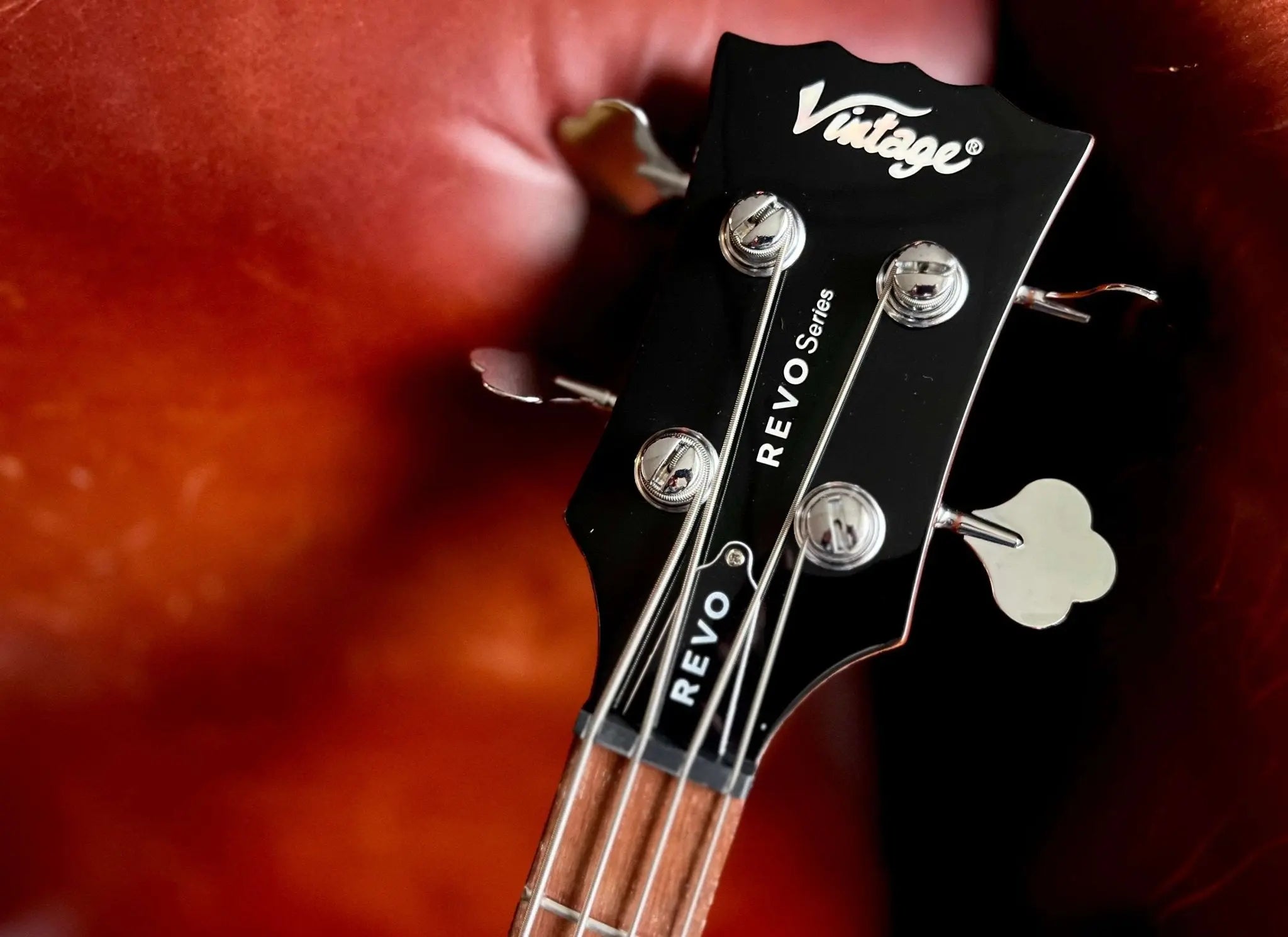 Vintage REVO Series 'Callan' Bass VRB70CR See Thru Cherry Red - Richards Guitars Of Stratford Upon Avon