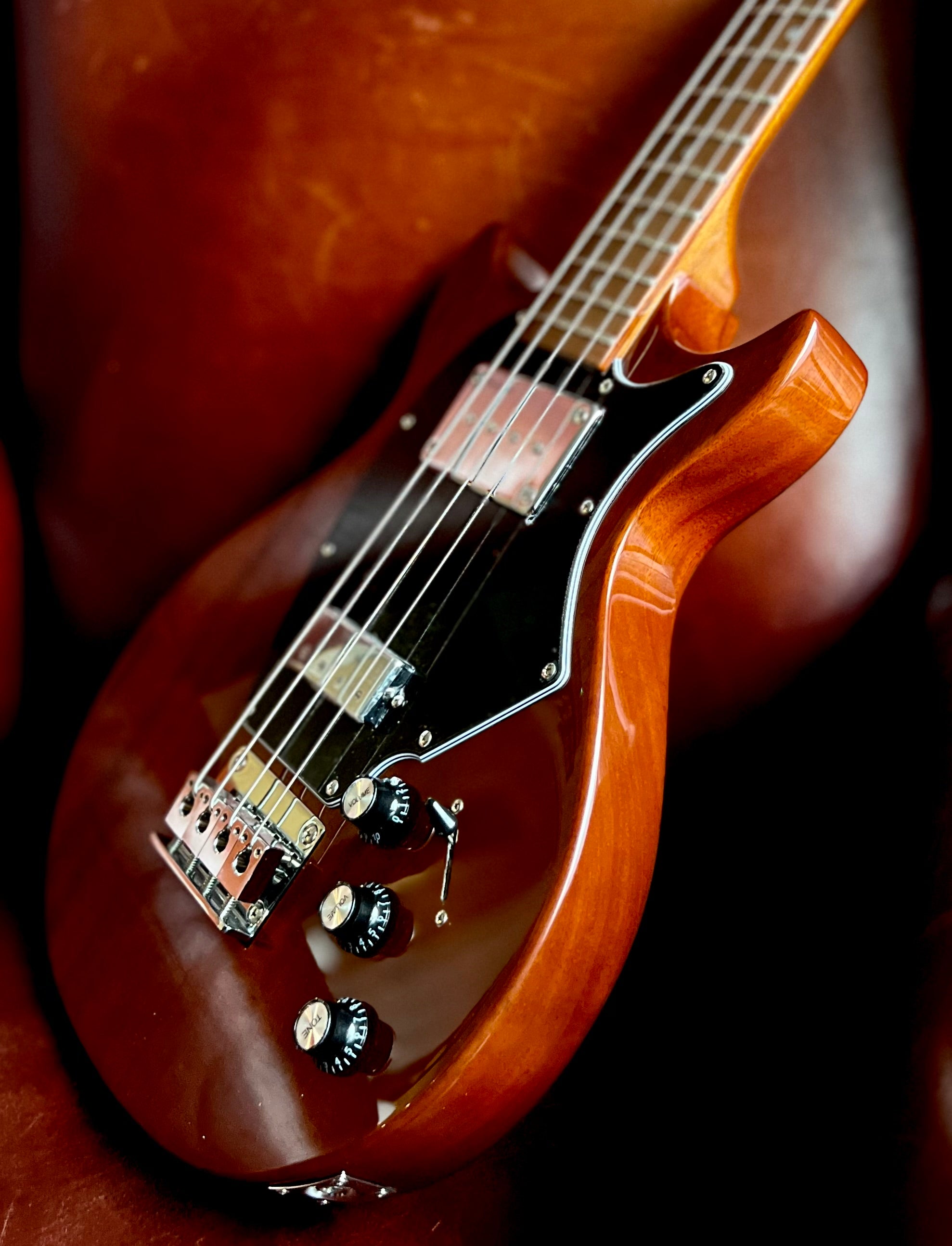 Vintage REVO Series 'Callan' Bass VRB70CR See Thru Cherry Red, Bass Guitar for sale at Richards Guitars.