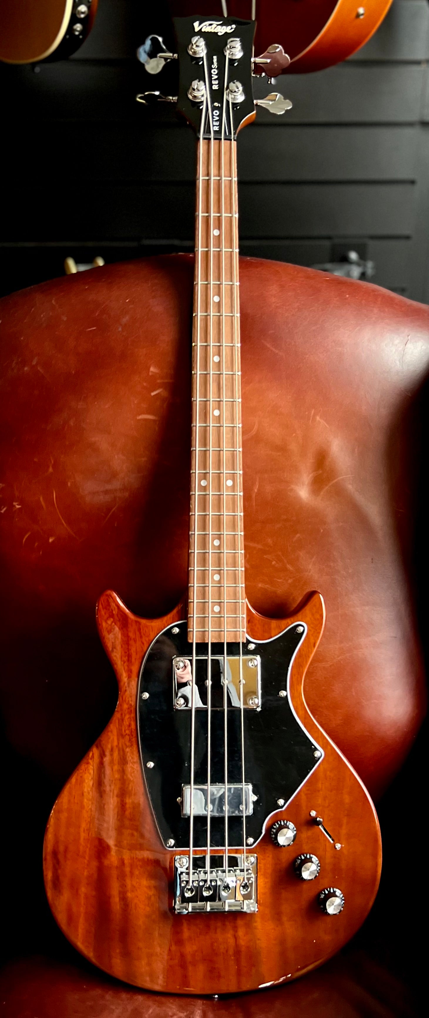 Vintage REVO Series 'Callan' Bass VRB70CR See Thru Cherry Red, Bass Guitar for sale at Richards Guitars.