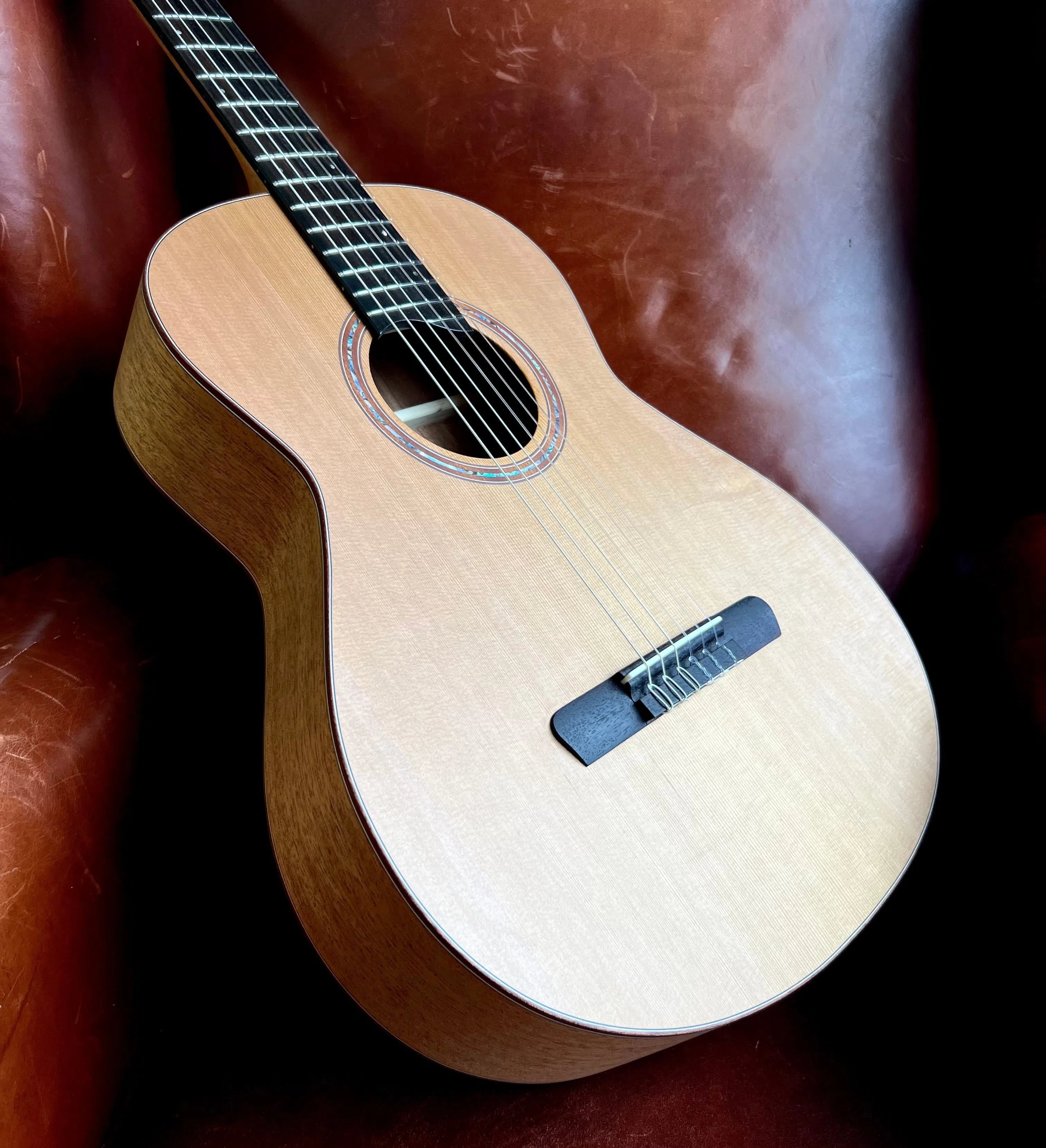 Dowina Mahogany OMG-H Cedar. OM Body Nylon Hybrid Acoustic Guitar, Nylon Strung Guitar for sale at Richards Guitars.