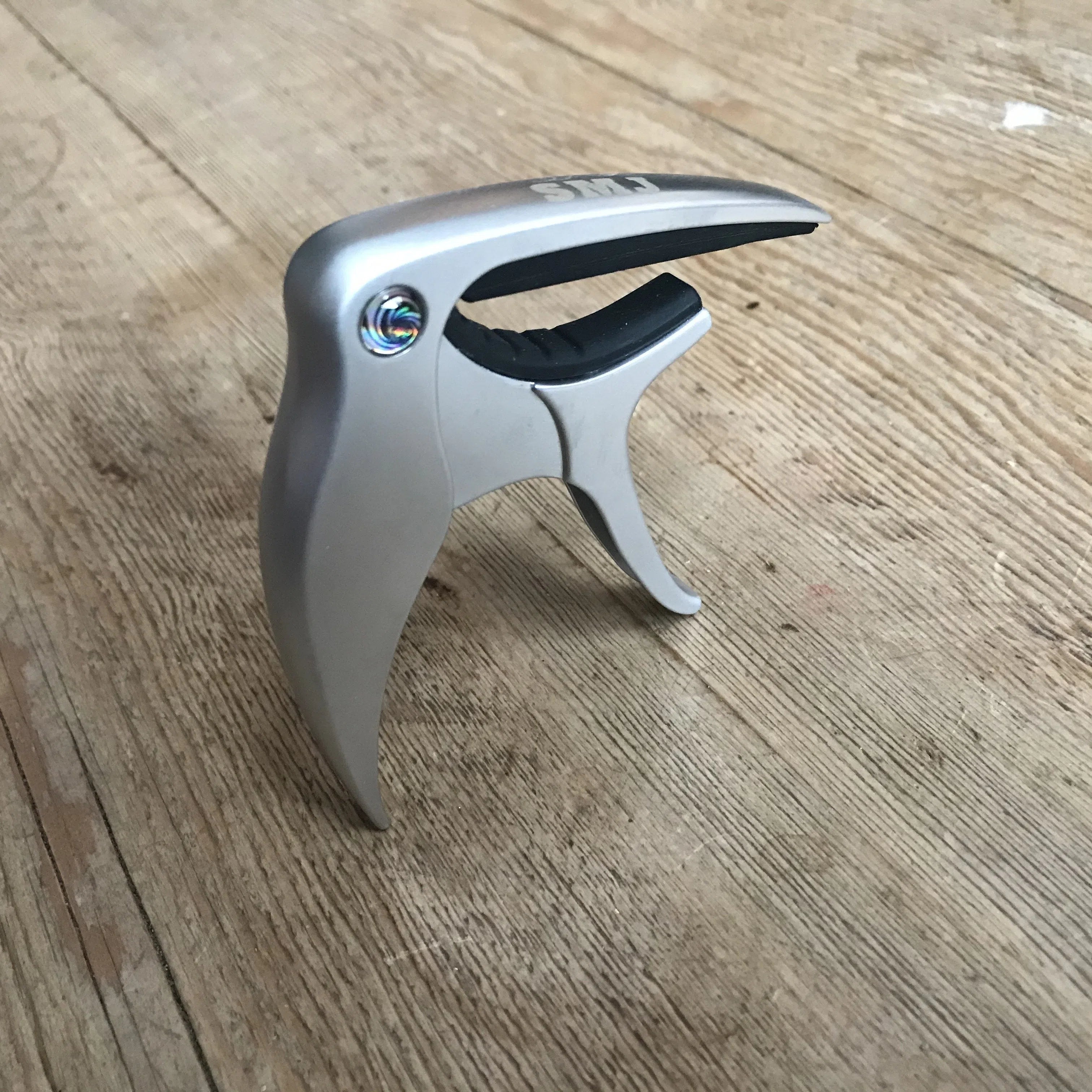 SMJ Guitar Capo (£1 Goes To Butterfly Conservation), Accessory for sale at Richards Guitars.