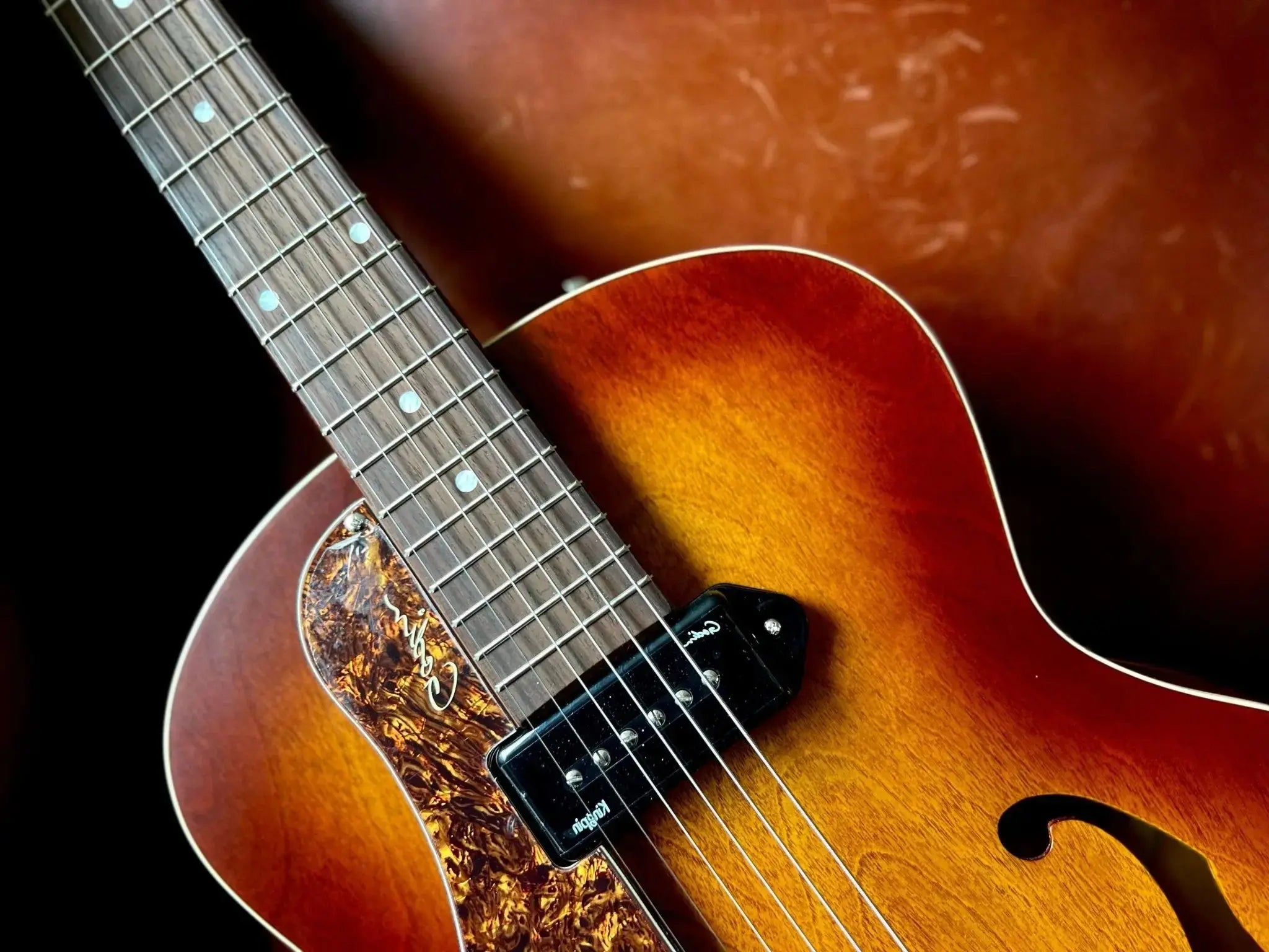 Explore the Godin 5th Avenue Kingpin P90 Cognac Burst with Tric