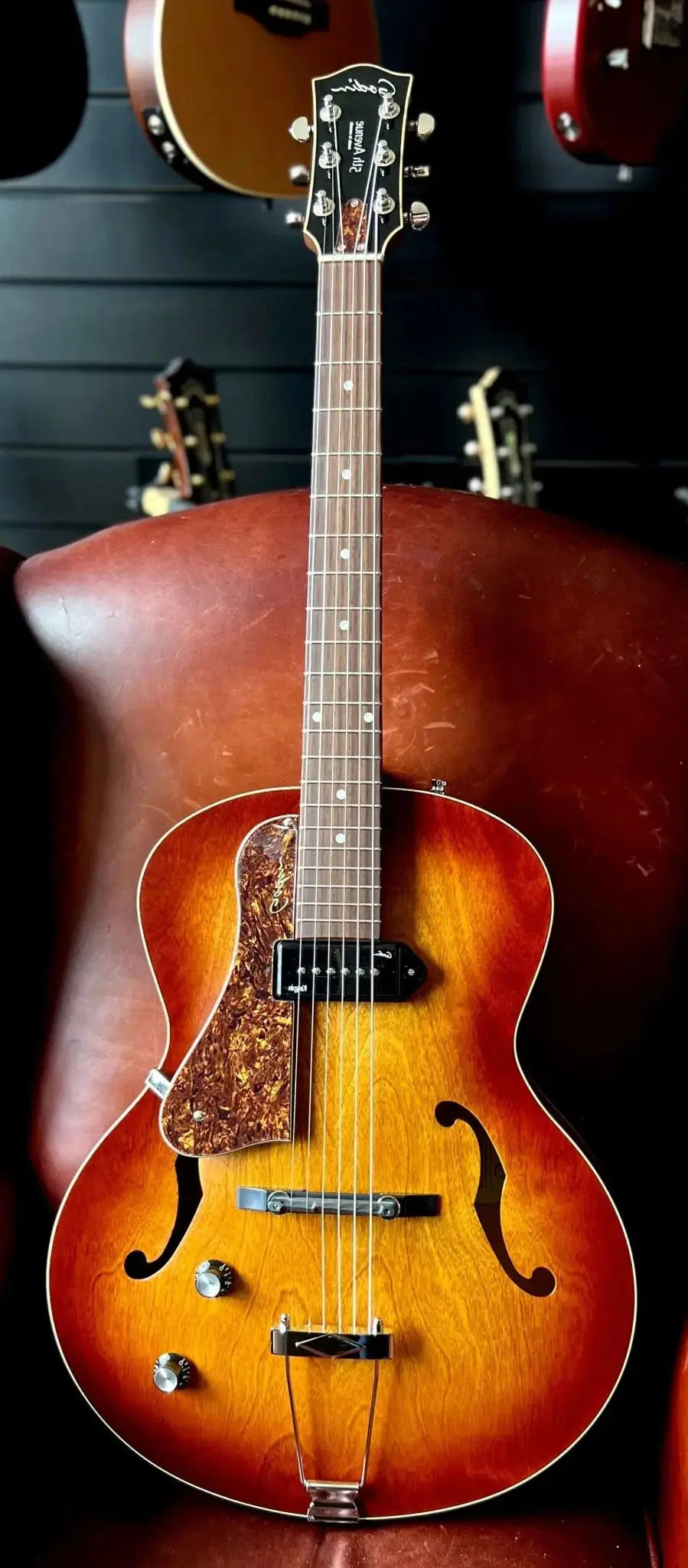 Explore the Godin 5th Avenue Kingpin P90 Cognac Burst with Tric