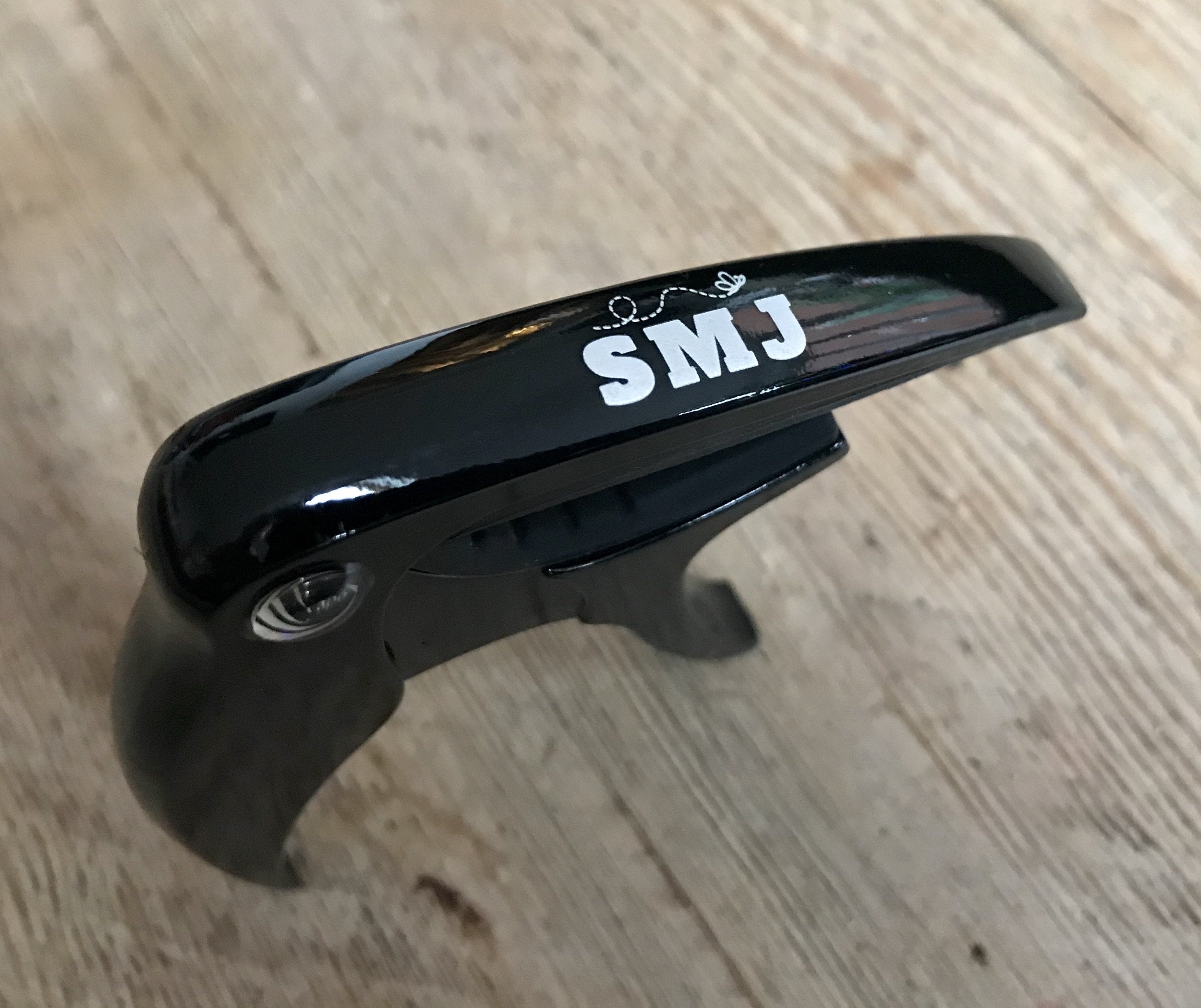 SMJ Guitar Capo (£1 Goes To Butterfly Conservation), Accessory for sale at Richards Guitars.