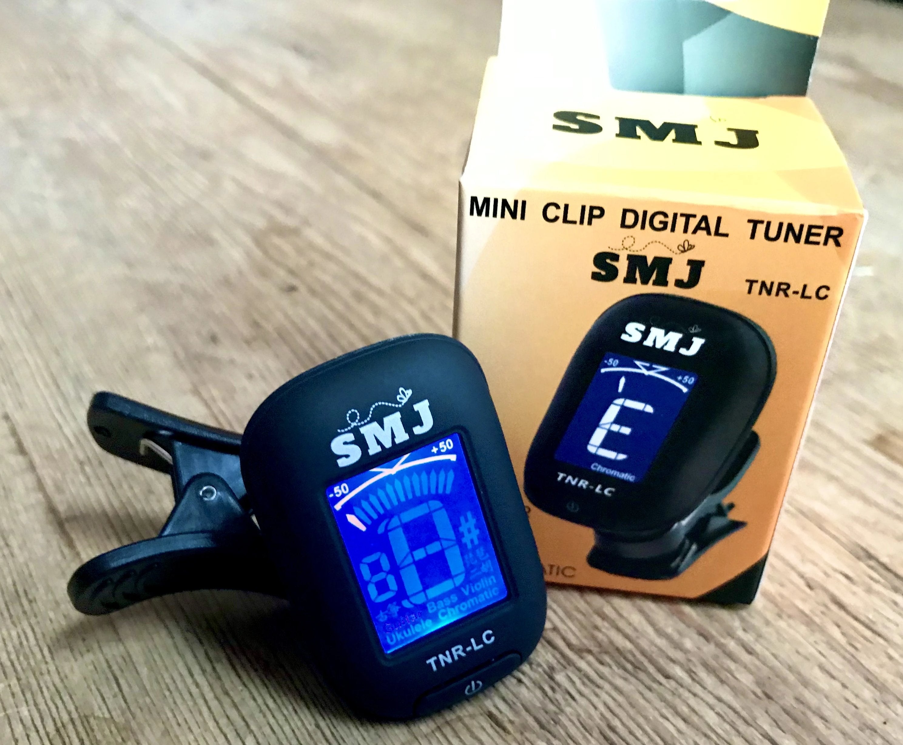 SMJ TNR "Headstock" Guitar Tuner, Accessory for sale at Richards Guitars.