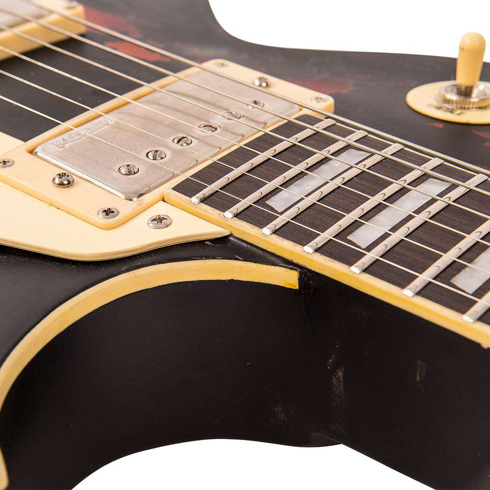Vintage V100MRBK ICON Electric Guitar ~ Distressed Black Over Sunburst, Guitare électrique en vente chez Richards Guitars.