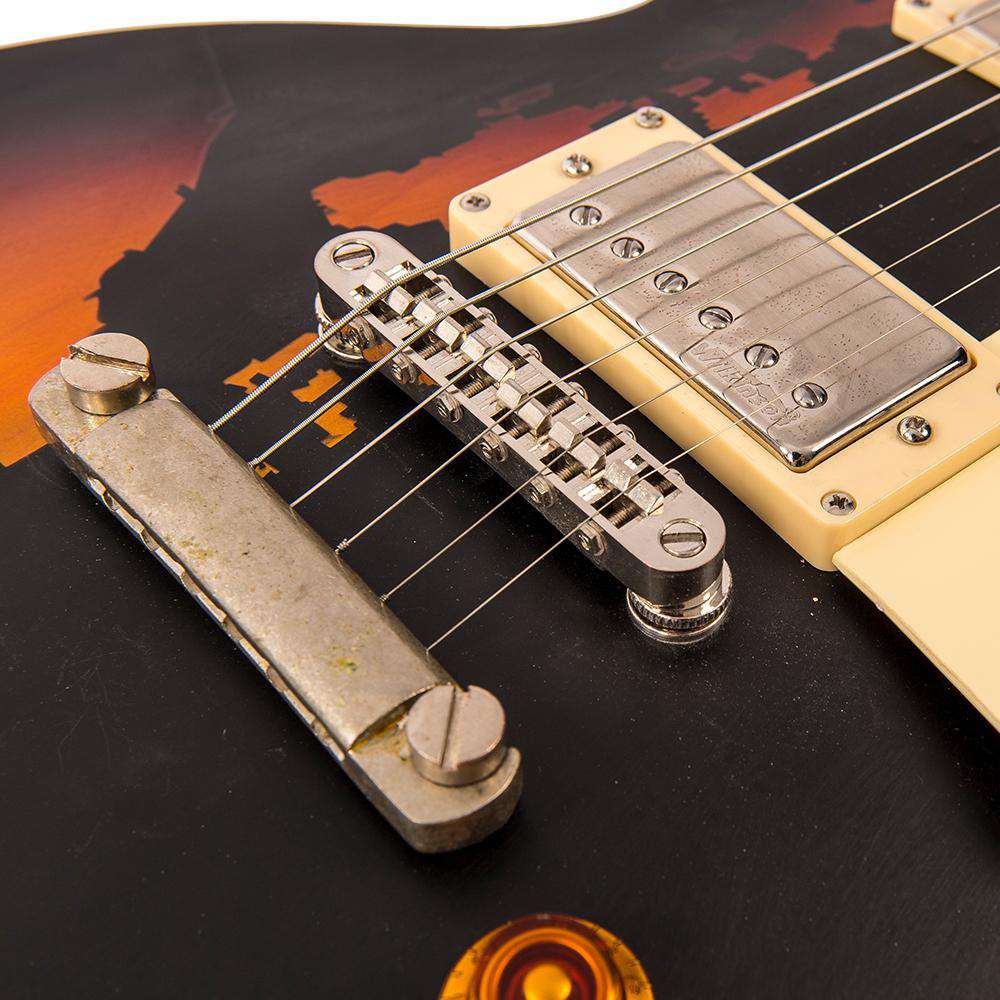 Vintage V100MRBK ICON Electric Guitar ~ Distressed Black Over Sunburst, Guitare électrique en vente chez Richards Guitars.