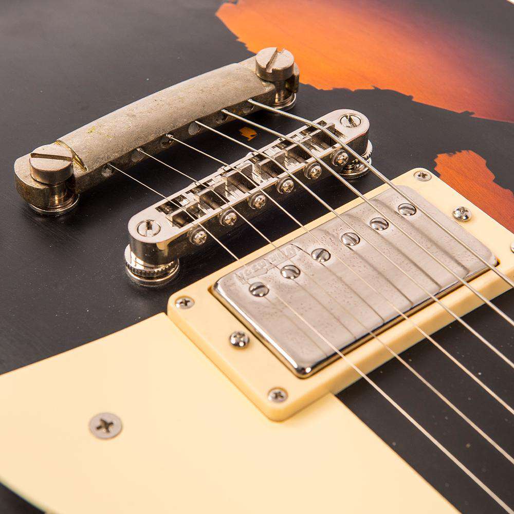 Vintage V100MRBK ICON Electric Guitar ~ Distressed Black Over Sunburst, Guitare électrique en vente chez Richards Guitars.
